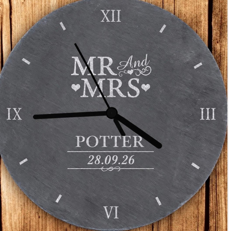Round personalised slate clock engraved Mr and Mrs Potter with wedding date