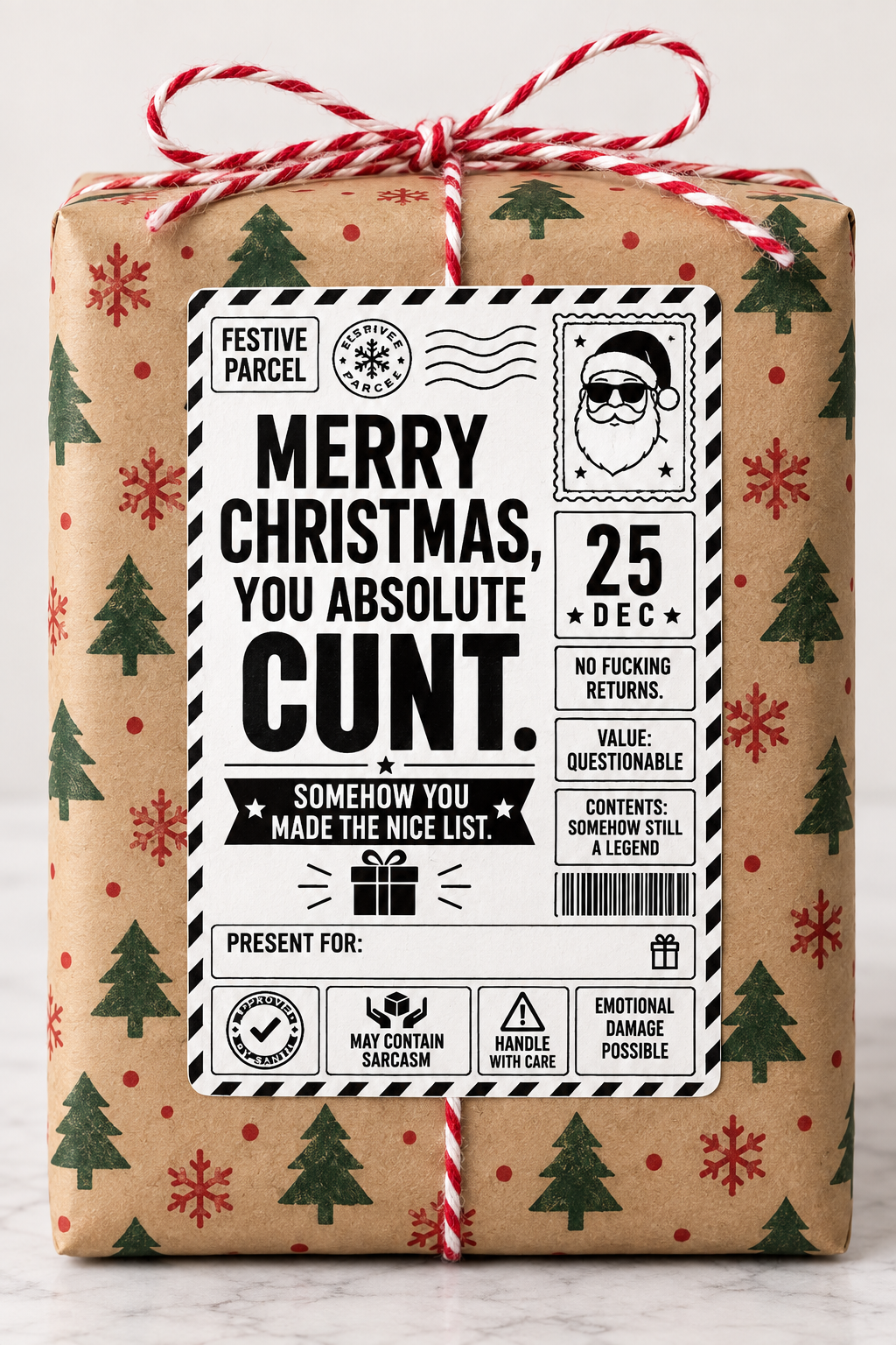 Rude Christmas parcel label design reading "Merry Christmas you absolute cunt"