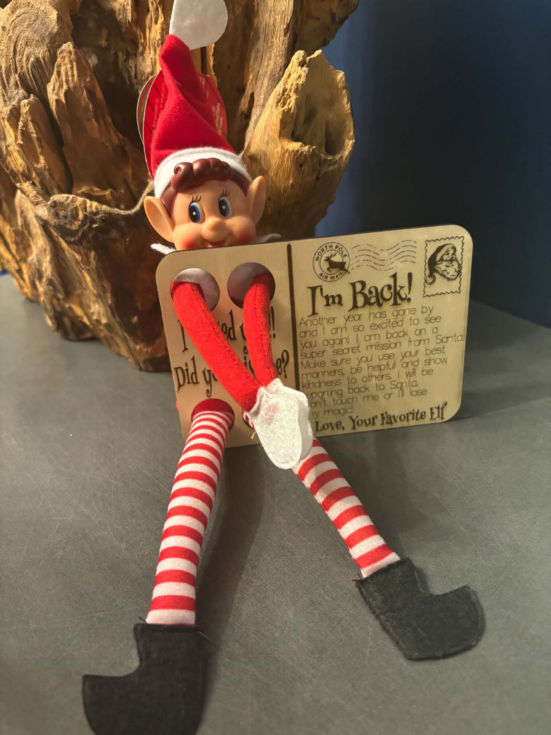 Wooden Elf I'm Back arrival board for Christmas