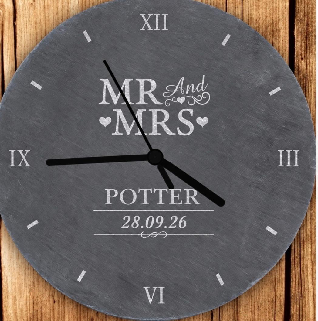 Round personalised slate clock engraved Mr and Mrs Potter with wedding date